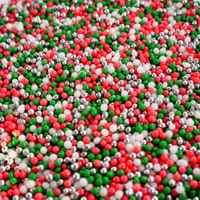 Produktbild von Streuselheld Nonpareille Twinkle Christmas 40g Streusel zum Dekorieren und Verzieren von Gebäck aller Art wie Torten Kuchen Keksen Zuckerstreusel