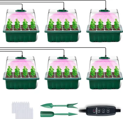 A set of six mini greenhouses with grow lights, along with gardening tools and plant markers, arranged on a white background.