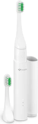 A white electric toothbrush and an extra brush head are displayed against a white background.