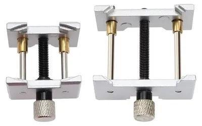 Produktbild von Uhrenhalter, verstellbar - Uhrenhalter - Multifunktionales Werkzeug - Reparaturwerkzeug - Verschleißfestes Legierungsmaterial - 2 Stück - Uhrenklemme