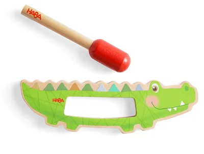 Produktbild von HABA Guiro Klang-Krokodil - Montessori-Holz-Musikspielzeug - Kinder-Musikinstrument ab 2 Jahren - Einfach zu Spielen - 2010994001