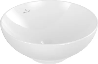 A white ceramic basin is shown from a slightly elevated side angle against a white background.