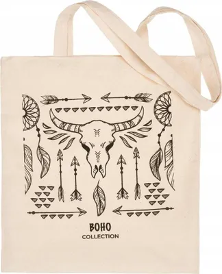 A beige canvas tote bag with a black bohemian-style print featuring a bull skull, arrows, and feathers.