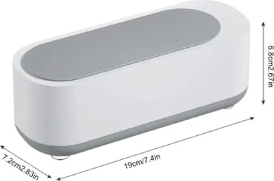 A white and gray ultrasonic cleaner with dimensions indicated.