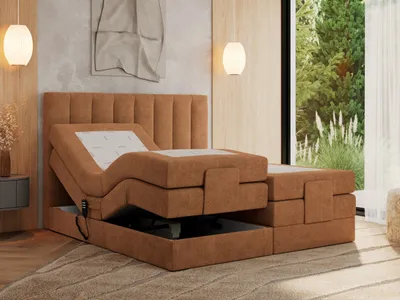 A bedroom setting with an adjustable bed.