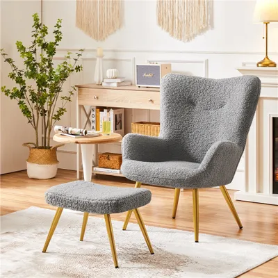 A gray fuzzy armchair and ottoman with gold legs are displayed in a living room setting.