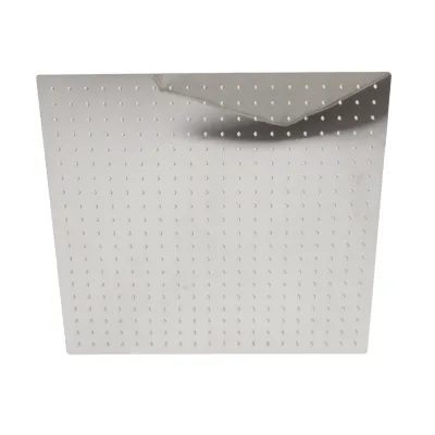 A square metal shower head with a grid of small holes and a folded flap on top, isolated on a white background.