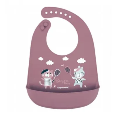 A baby bib with cartoon cats playing badminton.