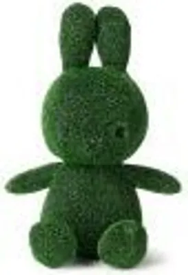 A green Miffy bunny toy sitting on a white background.