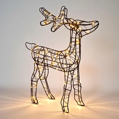 A wireframe reindeer decoration with LED lights.