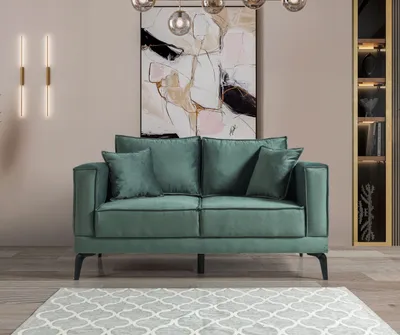 Image de Ce canapé au design moderne crée une atmosphère élégante et confortable.