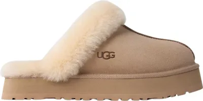 A single Ugg slipper on a white background.