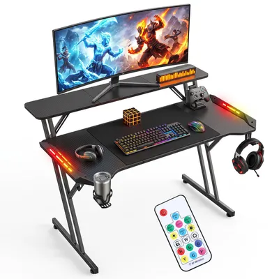 Produktbild von Peviasot Gamingtisch 120x60 cm Z-Form mit Ablage und RGB LED, Carbon-Optik