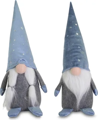 Two decorative gnomes with blue hats and white beards.