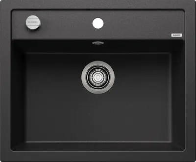 A black kitchen sink with a drain and faucet holes.