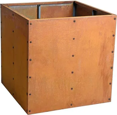 A square planter box made of weathered metal with visible rivets.