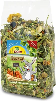 A bag of rabbit food with a cartoon rabbit and vegetables on the label.