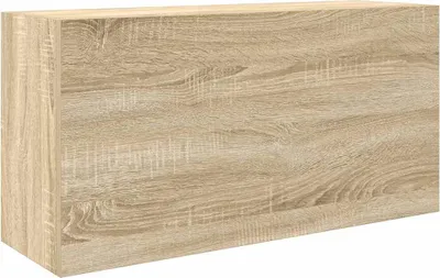 A close-up view of a wooden cabinet or shelf.