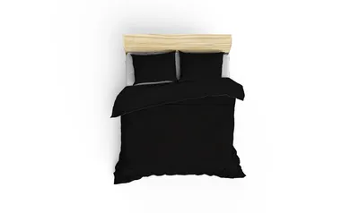 A top-down view of a black duvet and two black pillowcases on a wooden bed frame.