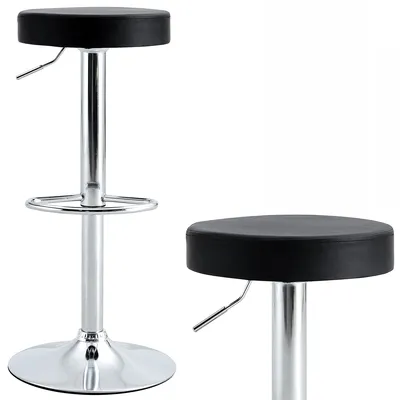 A studio shot of two black bar stools with chrome bases against a white background.