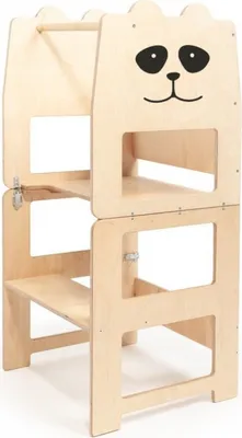 A wooden learning tower for children, designed to resemble a panda face.