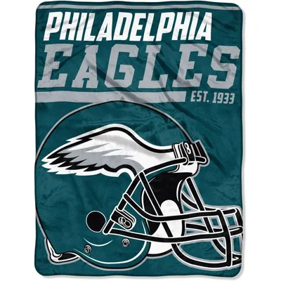 A Philadelphia Eagles blanket with the team's helmet logo.