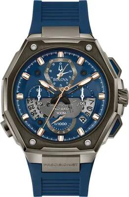 A close-up, front-facing view of a Bulova Precisionist chronograph watch with a blue dial and a blue rubber strap.