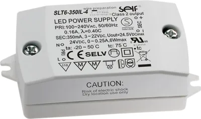 A white LED power supply unit with labels and symbols.