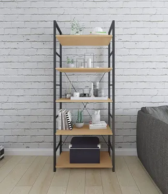 A shelf unit against a brick wall.