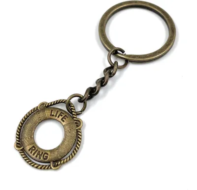Immagine prodotto di Onwomania Salvagente Portachiavi Salvagente Portafortuna in metallo in confezione regalo in alluminio, ideale come regalo