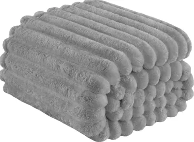 A folded gray blanket with a ribbed texture.