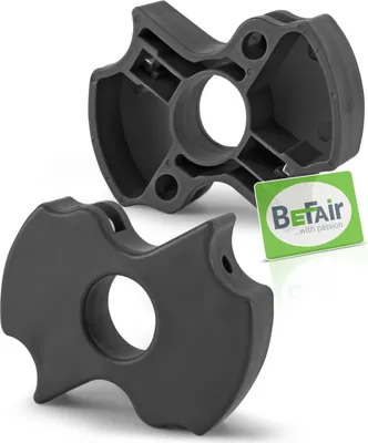 Two black plastic parts for a standing table, with a green card showing a logo and text.