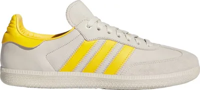 A side view of a single Adidas Humanrace Samba shoe.