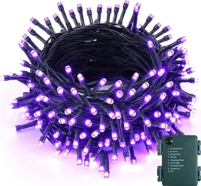 A coiled string of purple LED lights with a green battery pack.