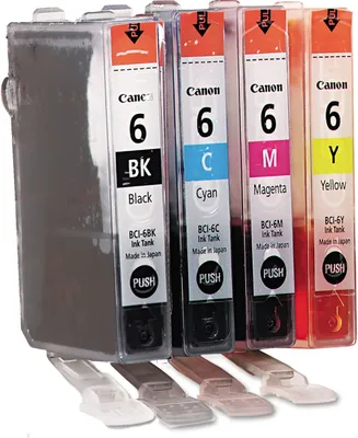 A set of four Canon ink cartridges.