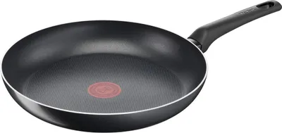 A black frying pan with a red indicator in the center and a black handle, shown from a slightly elevated side angle on a white background.