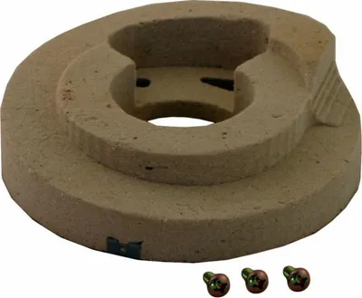 A close-up studio shot of a beige, circular component with a central opening and a stepped design. Three small screws are visible in the foreground.