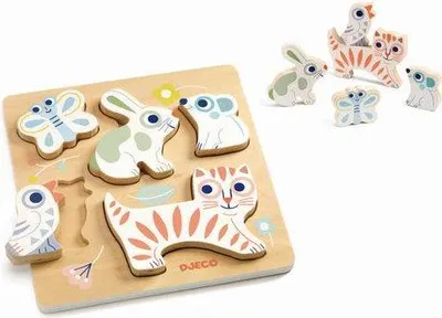 A wooden puzzle board with animal-shaped pieces and some pieces scattered around it.