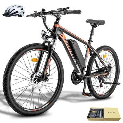 A black and orange electric mountain bike is shown against a white background. A white helmet is placed to the left of the bike.