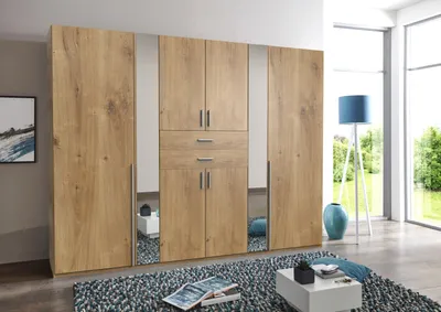 Produktbild von Kleiderschrank "Vanea" in PLANKENEICHE NACHBILDUNG mit 8 Türen und 4 Einlegeböden. Abmessungen (BxHxT) 270x210x58 cm