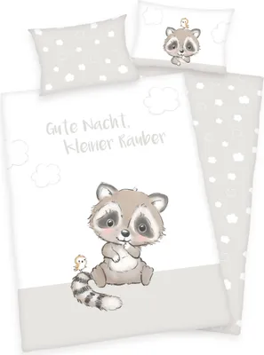 A baby bedding set with a raccoon illustration.