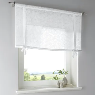 Produktbild von Raffgardine Lille aus 100% Baumwolle, halbtransparent, weiß mit bedrucktem floralem Muster. Bindebänder mit romantischer Schleife, Breite 60 x Höhe 100 cm