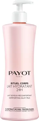 A pink bottle of Payot body lotion with a white pump dispenser.