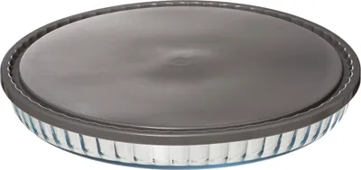 A glass pie dish with a gray silicone lid.