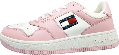 A side view of a pink and white Tommy Hilfiger sneaker.