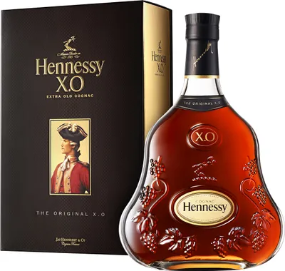 A bottle of Hennessy X.O. Extra Old Cognac and its gift box.