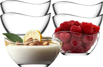 A set of clear glass bowls, some filled with food items like yogurt and raspberries.
