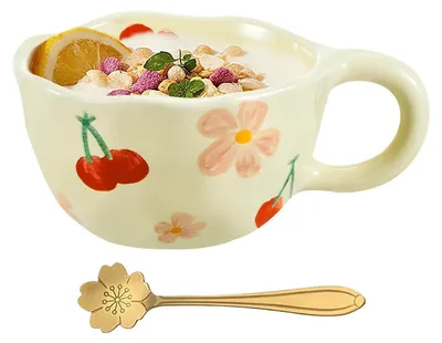 Productafbeelding van Keramische theekop van 250 ml met bloemenmotief en lepel