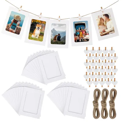 Produktbild von Fotorahmen-Set aus Karton - 30 Stück zum Aufhängen mit Holzclips und Hanfseilen - 11,5 x 15,5 cm - Weiß