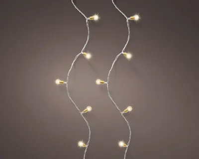 Two strings of vintage-style LED lights are shown against a plain background.